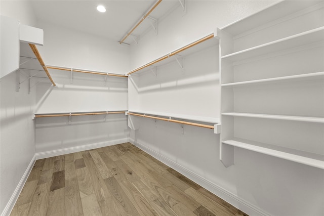 3148 Bryne Ln, Rockwall, TX 75087 - spacious closet with wood finished floors
