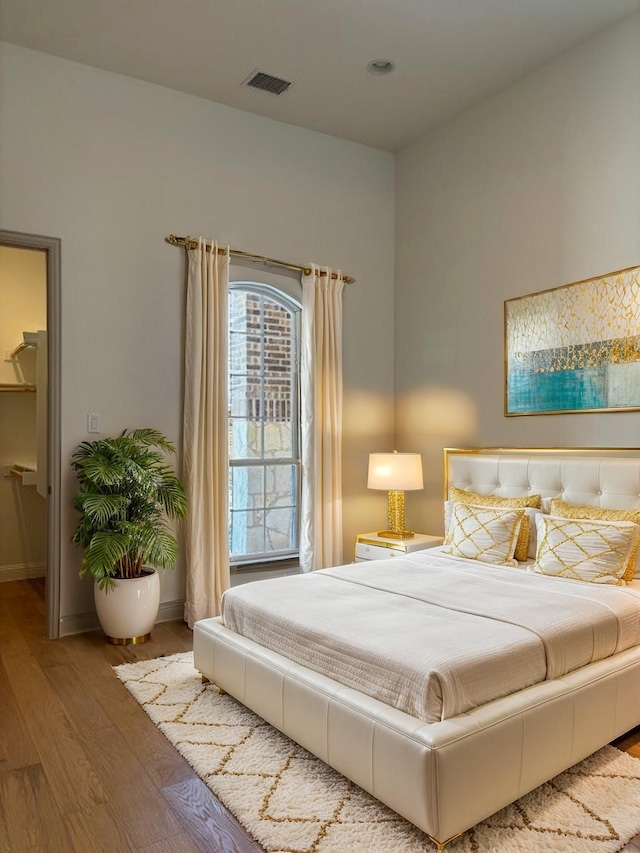 3148 Bryne Ln, Rockwall, TX 75087 - bedroom featuring wood finished floors and baseboards