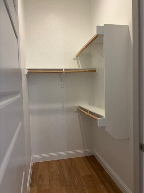 3148 Bryne Ln, Rockwall, TX 75087 - walk in closet featuring wood finished floors
