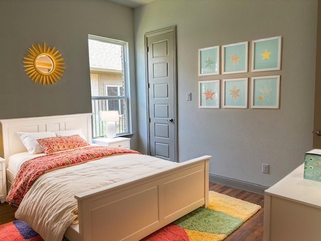 3148 Bryne Ln, Rockwall, TX 75087 - bedroom with dark wood finished floors