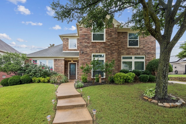 1608 Highland Oaks Dr, Keller, TX 76248 - traditional home with a front yard, brick siding, and roof with shingles