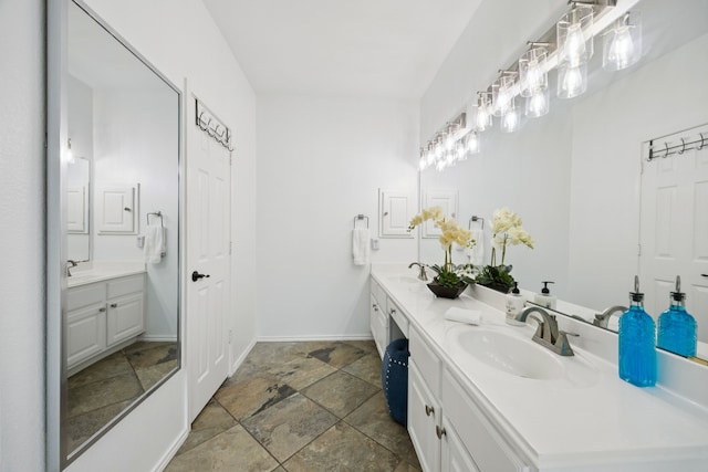 1608 Highland Oaks Dr, Keller, TX 76248 - bathroom with double vanity and stone finish floors