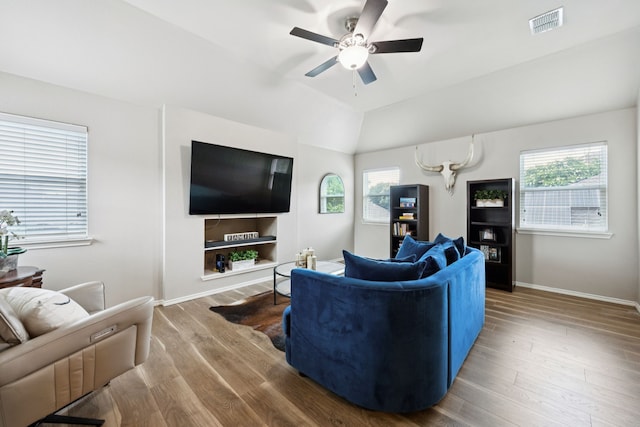 1608 Highland Oaks Dr, Keller, TX 76248 - living area with a ceiling fan, healthy amount of natural light, wood finished floors, and lofted ceiling