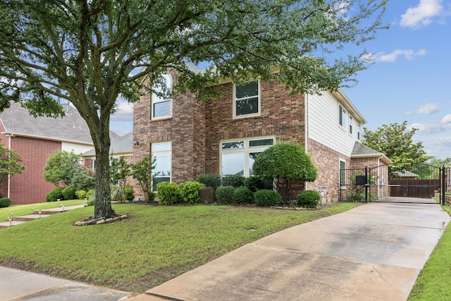 1608 Highland Oaks Dr, Keller, TX 76248 - traditional home with driveway, brick siding, and a gate