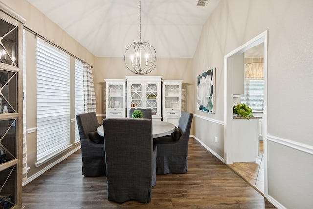 1608 Highland Oaks Dr, Keller, TX 76248 - dining area with a chandelier, dark wood-style flooring, and lofted ceiling