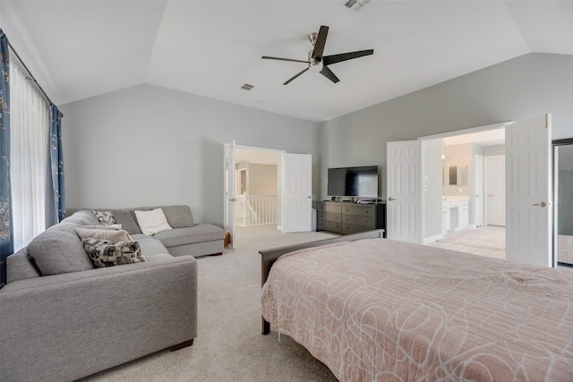 2525 Amber Ln, Flower Mound, TX 75028 - bedroom featuring lofted ceiling, connected bathroom, ceiling fan, and light carpet