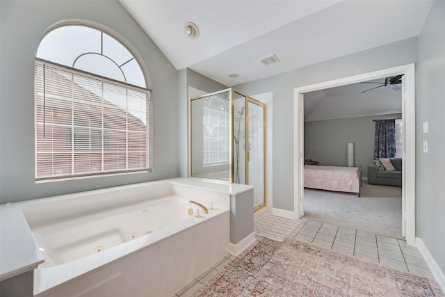 2525 Amber Ln, Flower Mound, TX 75028 - ensuite bathroom with a jetted tub, a stall shower, tile patterned flooring, vaulted ceiling, and ceiling fan