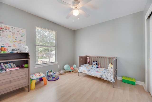 2525 Amber Ln, Flower Mound, TX 75028 - bedroom with wood finished floors and ceiling fan