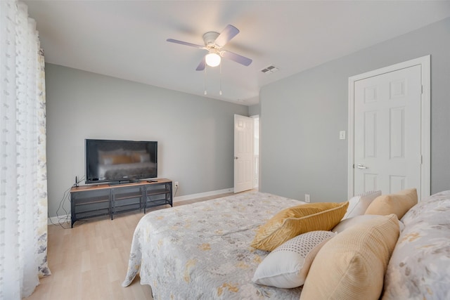 2525 Amber Ln, Flower Mound, TX 75028 - bedroom featuring wood finished floors and ceiling fan