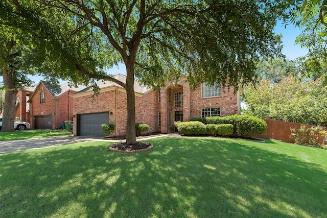 2525 Amber Ln, Flower Mound, TX 75028 - view of front of home with brick siding, concrete driveway, and an attached garage