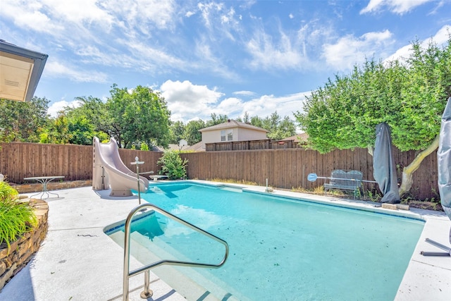 3404 Appalachian Way, Plano, TX 75075 - view of swimming pool featuring a water slide, a fenced backyard, and a patio area