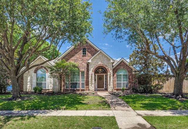5628 Vineyard Ln, Mckinney, TX 75070 - view of front of home featuring stone siding and brick siding