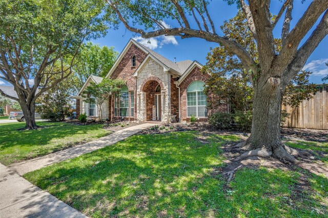 5628 Vineyard Ln, Mckinney, TX 75070 - traditional-style house featuring brick siding and stone siding