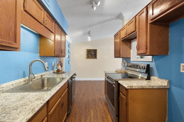 6503 Ridgecrest Rd Unit 107G, Dallas, TX 75231 - kitchen featuring electric stove, track lighting, light countertops, dark wood finished floors, and a textured ceiling