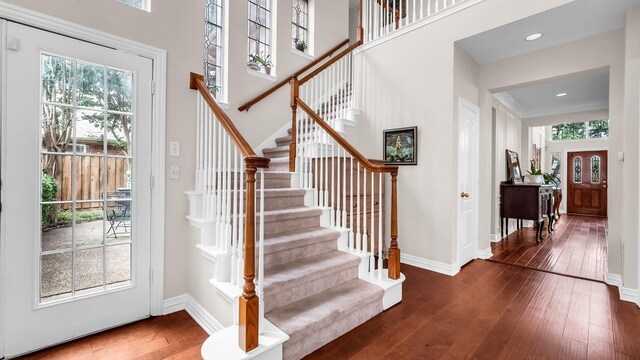 6740 Magnum Dr, Plano, TX 75024 - entryway with plenty of natural light, stairs, hardwood / wood-style flooring, and recessed lighting