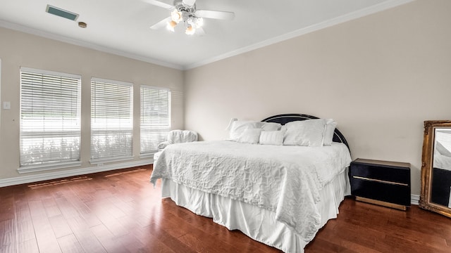 6740 Magnum Dr, Plano, TX 75024 - bedroom with ornamental molding, dark wood-style floors, and ceiling fan
