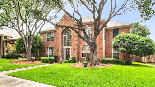6740 Magnum Dr, Plano, TX 75024 - traditional home with brick siding