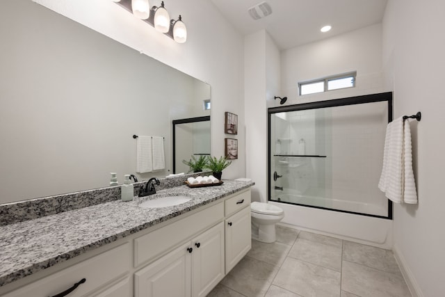 8240 Odell St, North Richland Hills, TX 76182 - full bath featuring vanity, shower / bath combination with glass door, and tile patterned floors