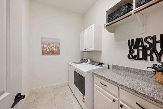 8240 Odell St, North Richland Hills, TX 76182 - laundry room with cabinet space and washer and dryer
