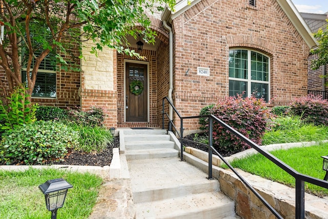 8240 Odell St, North Richland Hills, TX 76182 - property entrance featuring brick siding