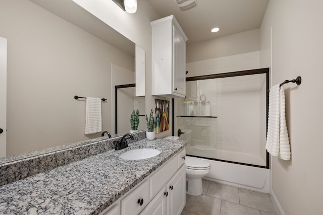 8240 Odell St, North Richland Hills, TX 76182 - bathroom featuring vanity, shower / bath combination with glass door, and tile patterned floors
