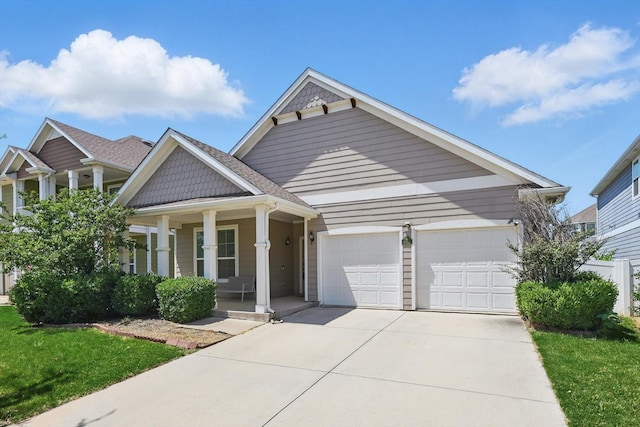 9009 Benevolent Ct, Providence Village, TX 76227 - view of front of property featuring covered porch, an attached garage, and driveway