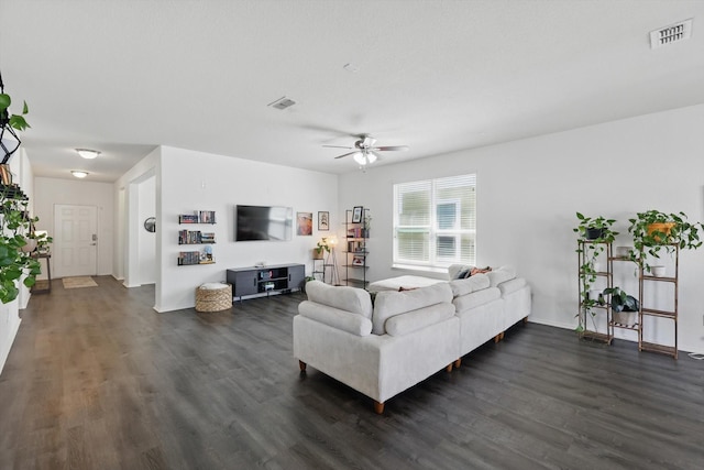 9009 Benevolent Ct, Providence Village, TX 76227 - living room featuring dark wood-style flooring and a ceiling fan