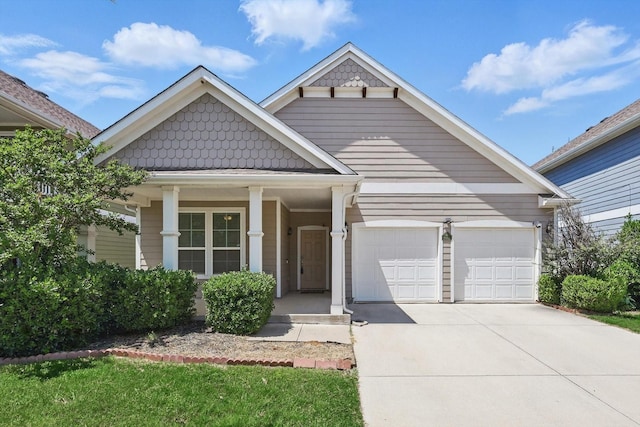9009 Benevolent Ct, Providence Village, TX 76227 - view of front of home with a garage, concrete driveway, and covered porch