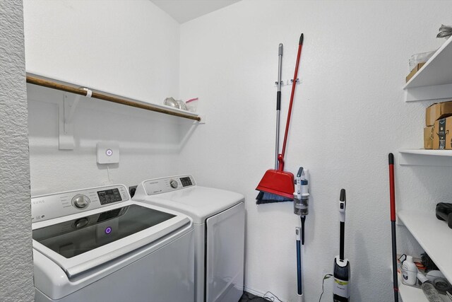 9009 Benevolent Ct, Providence Village, TX 76227 - laundry area with separate washer and dryer