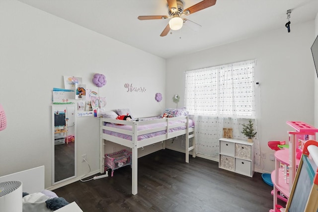 9009 Benevolent Ct, Providence Village, TX 76227 - bedroom featuring wood finished floors and ceiling fan