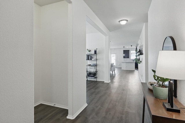 9009 Benevolent Ct, Providence Village, TX 76227 - corridor with dark wood-style floors and baseboards