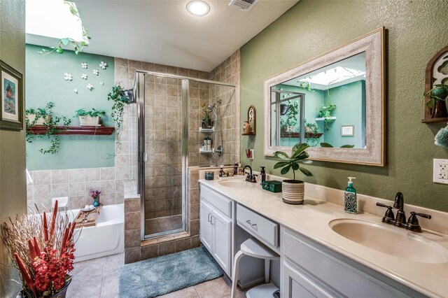17342 Remington Park Pl, Dallas, TX 75252 - full bath with a shower stall, double vanity, a bath, tile patterned floors, and a textured wall