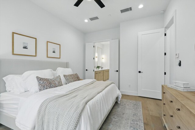 4208 Live Oak St Unit 102, Dallas, TX 75204 - bedroom with light wood-style floors, recessed lighting, ensuite bath, and ceiling fan