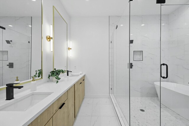 4208 Live Oak St Unit 102, Dallas, TX 75204 - full bath with marble finish floors, a freestanding tub, double vanity, and a marble finish shower