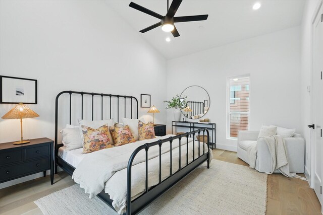 4208 Live Oak St Unit 102, Dallas, TX 75204 - bedroom featuring recessed lighting, light wood-type flooring, a ceiling fan, and high vaulted ceiling