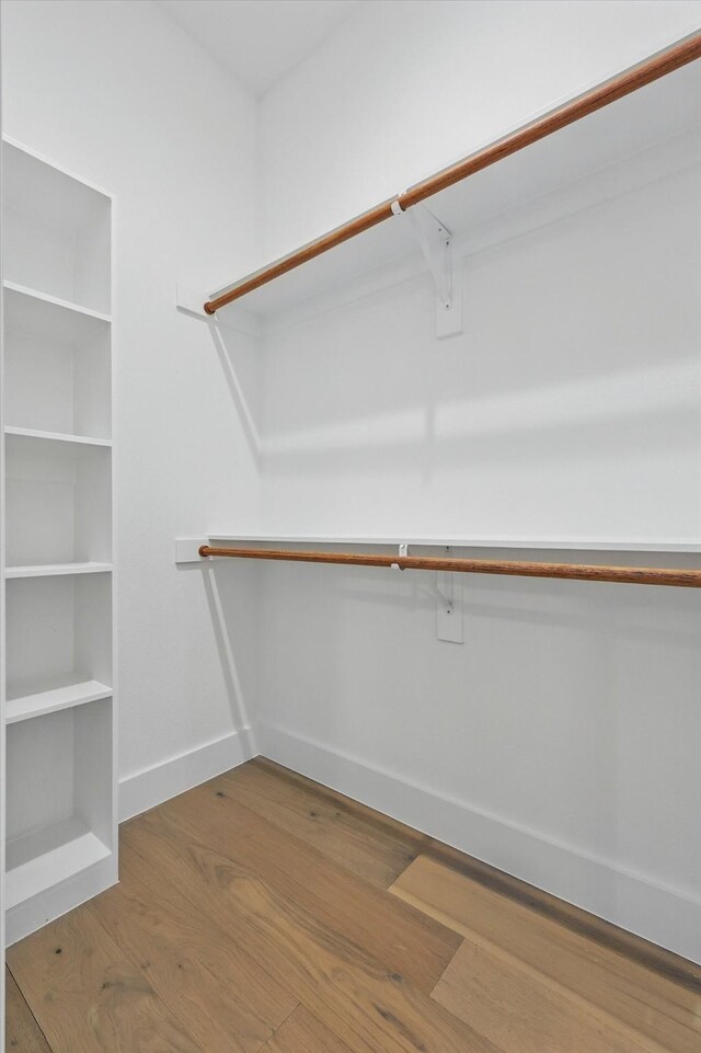 4208 Live Oak St Unit 102, Dallas, TX 75204 - spacious closet with wood finished floors