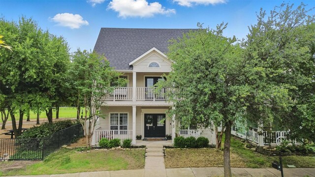 1828 Brown Thrasher Blvd, Savannah, TX 76227 - view of front facade featuring a porch, a balcony, and roof with shingles