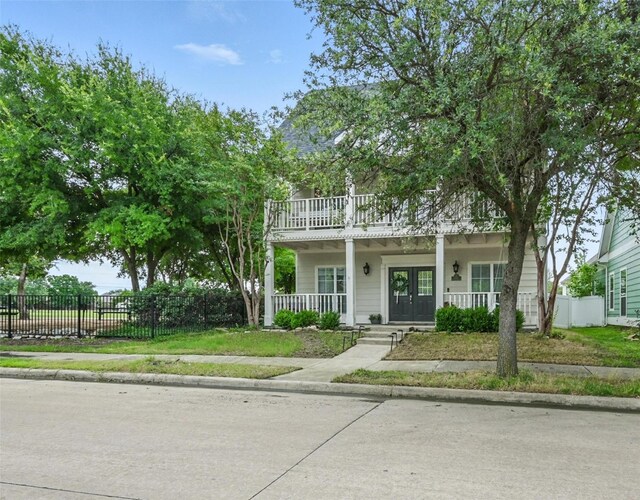 1828 Brown Thrasher Blvd, Savannah, TX 76227 - obstructed view of property with french doors and a porch
