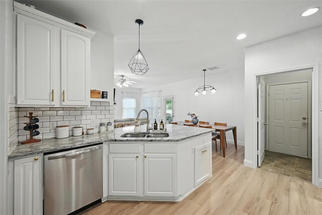 1828 Brown Thrasher Blvd, Savannah, TX 76227 - kitchen featuring dishwasher, a peninsula, white cabinets, tasteful backsplash, and ceiling fan