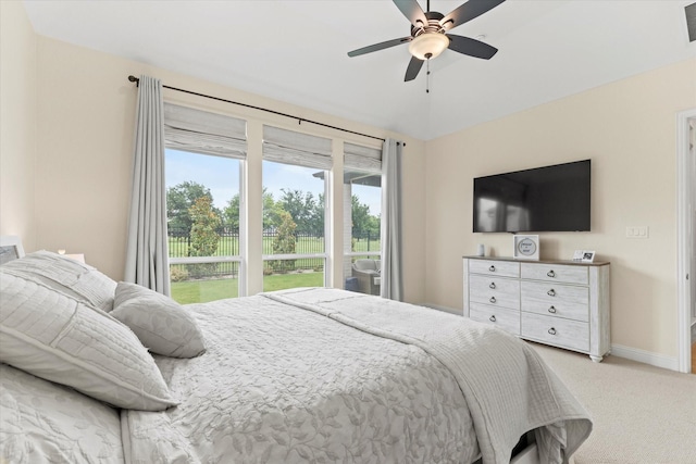 8417 Wembley, The Colony, TX 75056 - bedroom featuring light colored carpet and a ceiling fan