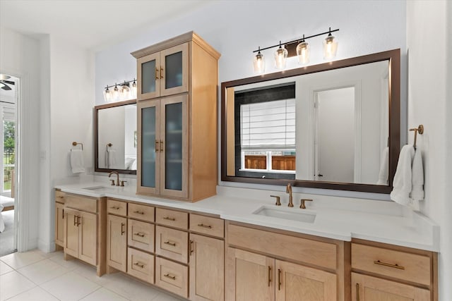 8417 Wembley, The Colony, TX 75056 - ensuite bathroom featuring double vanity and tile patterned floors