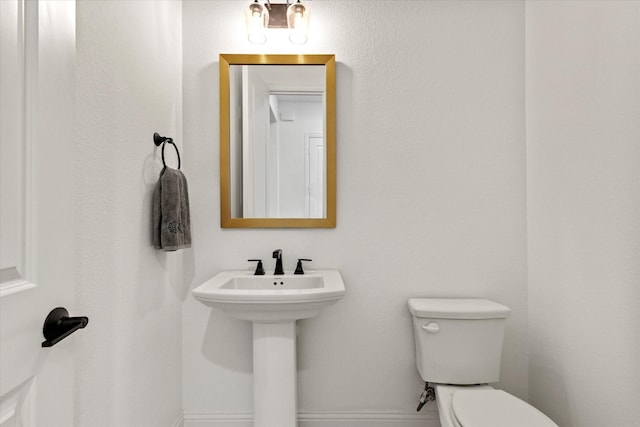 8417 Wembley, The Colony, TX 75056 - bathroom with toilet and baseboards