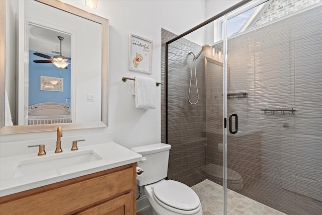 8417 Wembley, The Colony, TX 75056 - full bath featuring vanity, a stall shower, and a ceiling fan