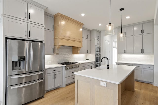 8417 Wembley, The Colony, TX 75056 - kitchen featuring stainless steel appliances, backsplash, light wood-style floors, custom exhaust hood, and recessed lighting