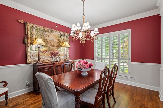 4896 Corinthian Bay Dr, Frisco, TX 75034 - dining area featuring a chandelier, crown molding, and wood finished floors