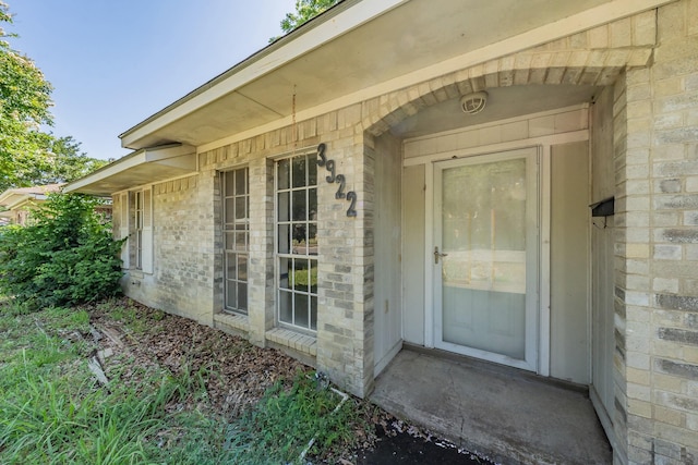 3922 Greenway Dr, Garland, TX 75041 - doorway to property with brick siding