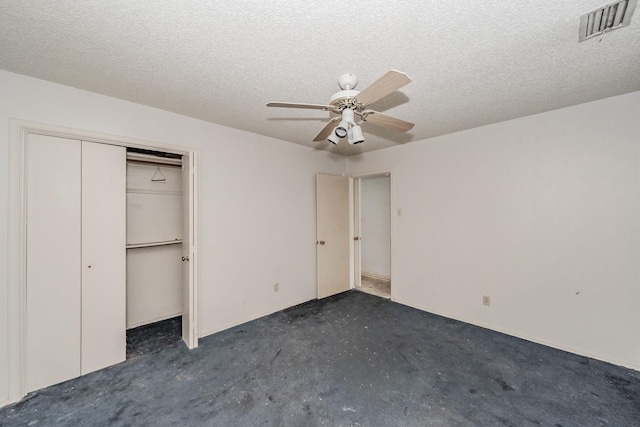 3922 Greenway Dr, Garland, TX 75041 - unfurnished bedroom featuring a closet, a ceiling fan, and a textured ceiling