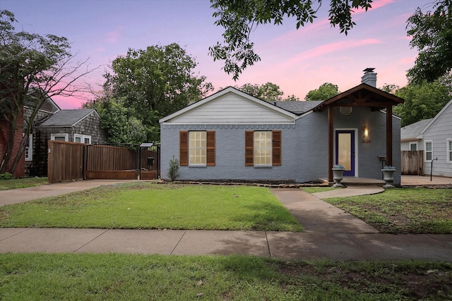 3620 Stadium Dr, Fort Worth, TX 76109 - view of front facade featuring a chimney, brick siding, and a gate