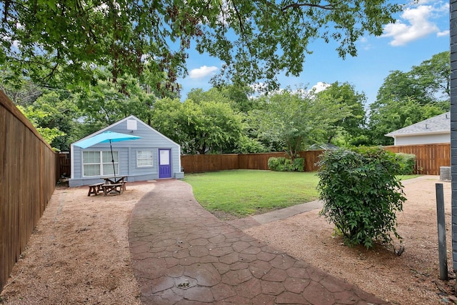 3620 Stadium Dr, Fort Worth, TX 76109 - fenced backyard with a patio and an outbuilding