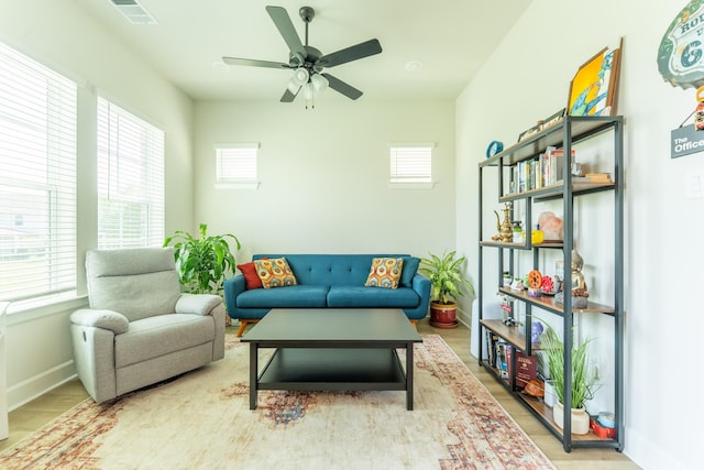 8849 Redding St, North Richland Hills, TX 76180 - living area featuring plenty of natural light, ceiling fan, and wood finished floors